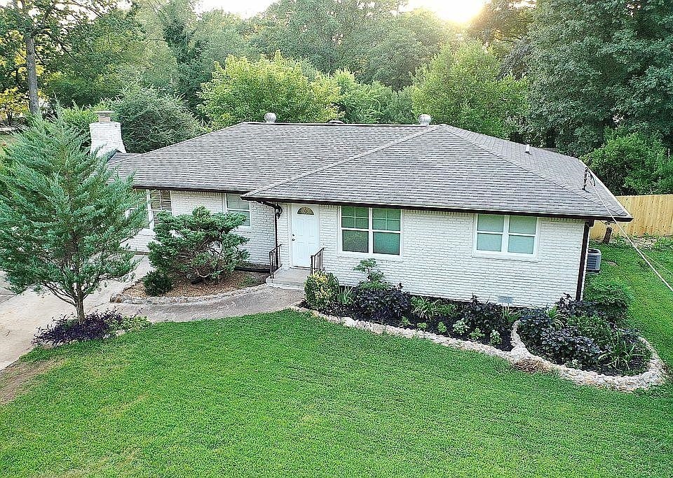 2649 County Line Road Southwest Atlanta, GA 30331 - Photo 1 of 1 a aerial view of a house next to a yard