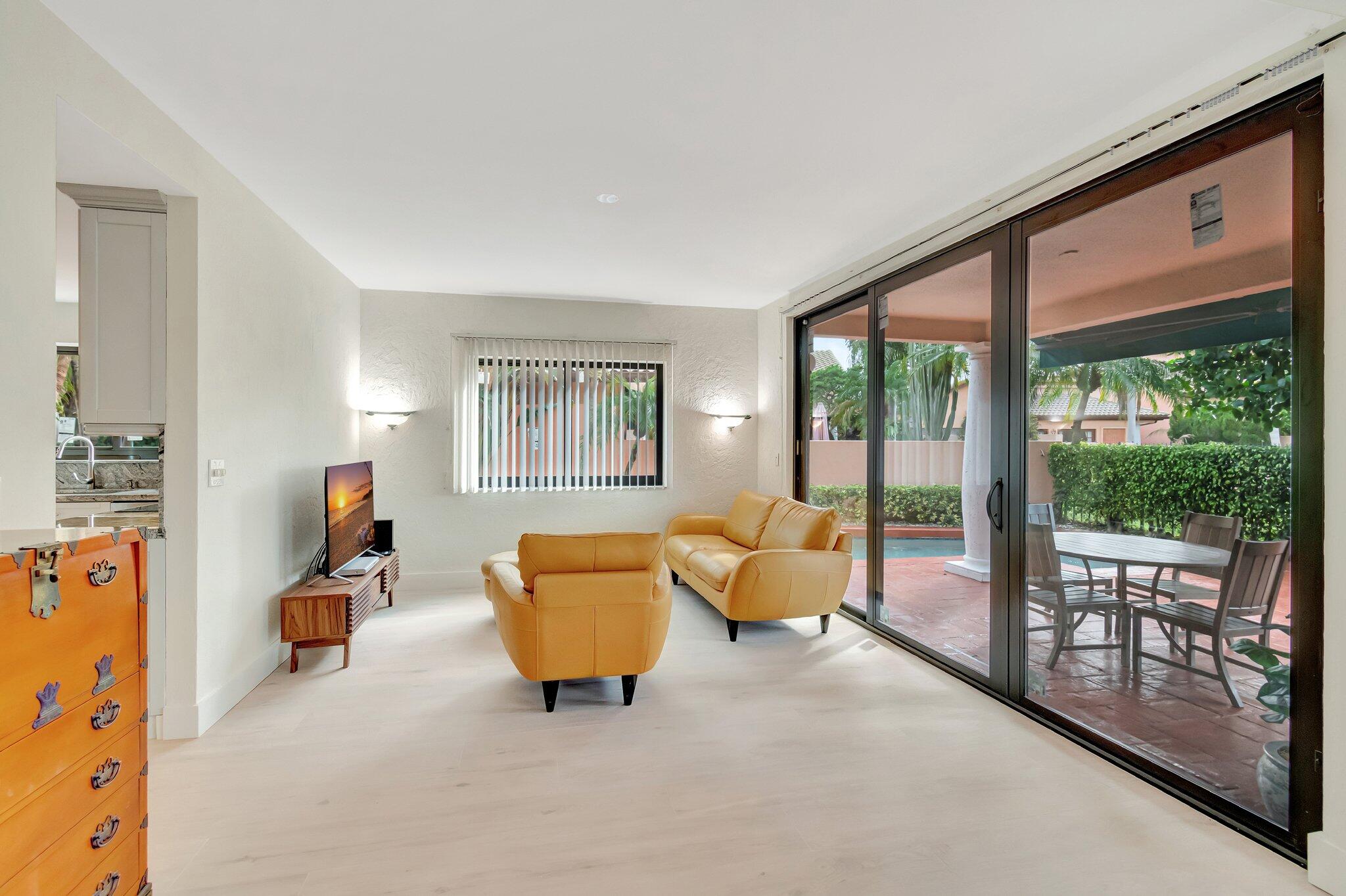 6427 Via Rosa Boca Raton, FL 33433 - Photo 19 of 80 a room with furniture and a window