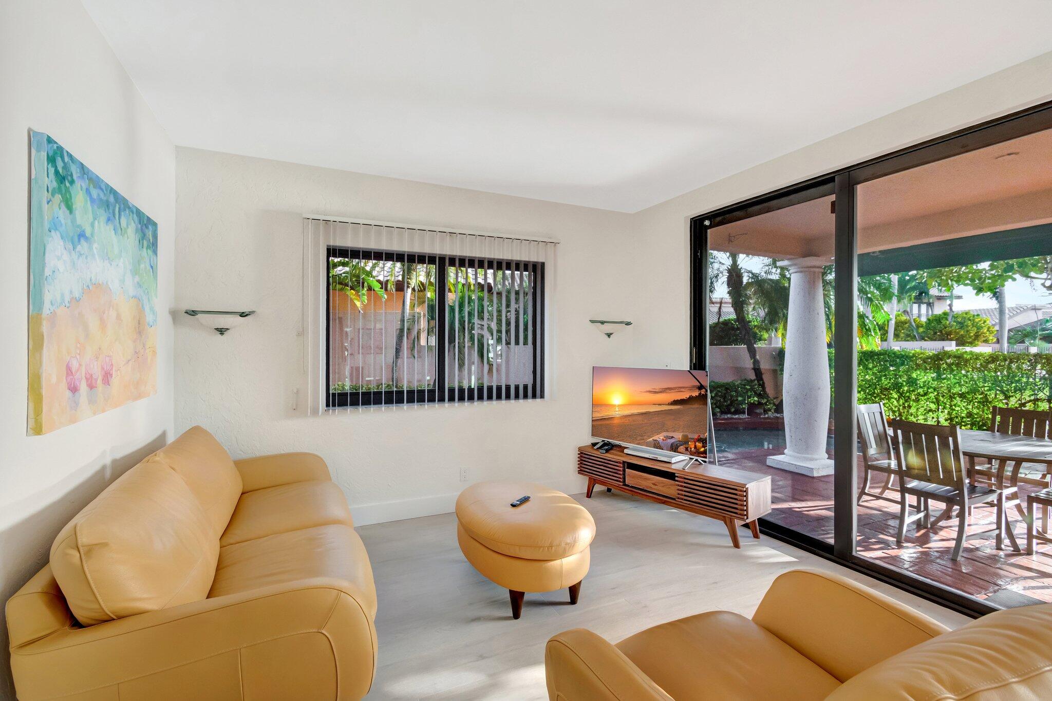 6427 Via Rosa Boca Raton, FL 33433 - Photo 20 of 80 a living room with furniture and a large window