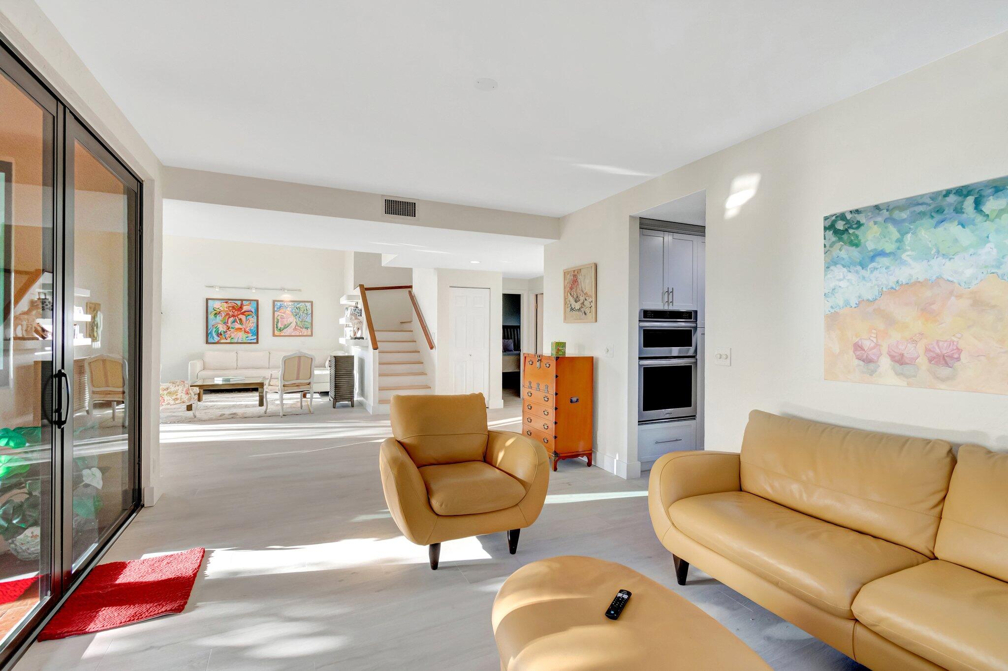 6427 Via Rosa Boca Raton, FL 33433 - Photo 22 of 80 a living room with furniture and a rug