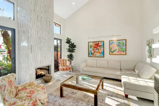 a white bath tub sitting next to a white sink