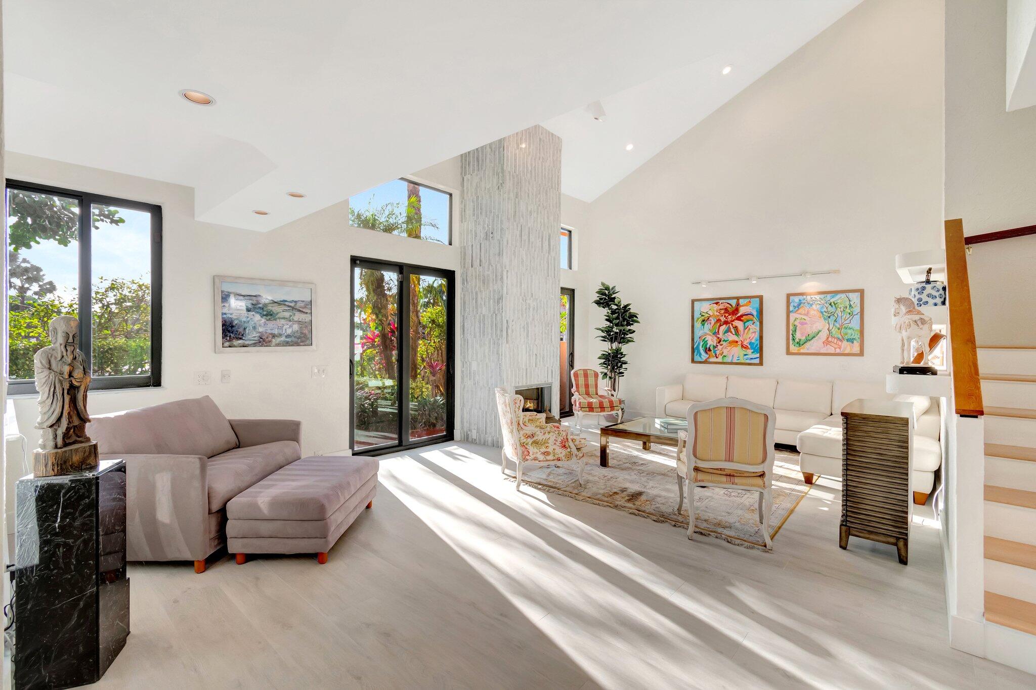 6427 Via Rosa Boca Raton, FL 33433 - Photo 30 of 80 a living room with furniture and a large window