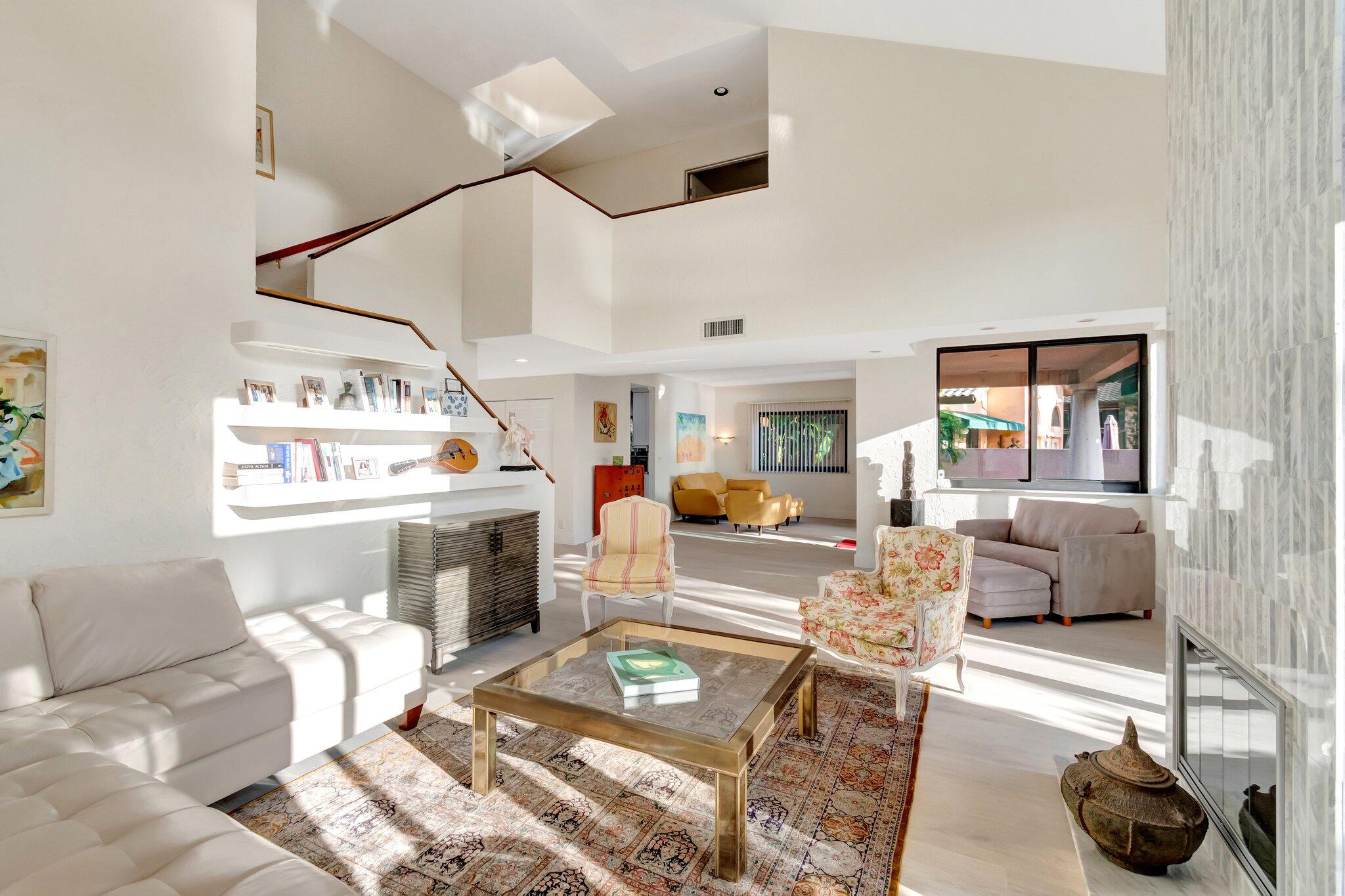 6427 Via Rosa Boca Raton, FL 33433 - Photo 34 of 80 a living room with furniture and a fireplace