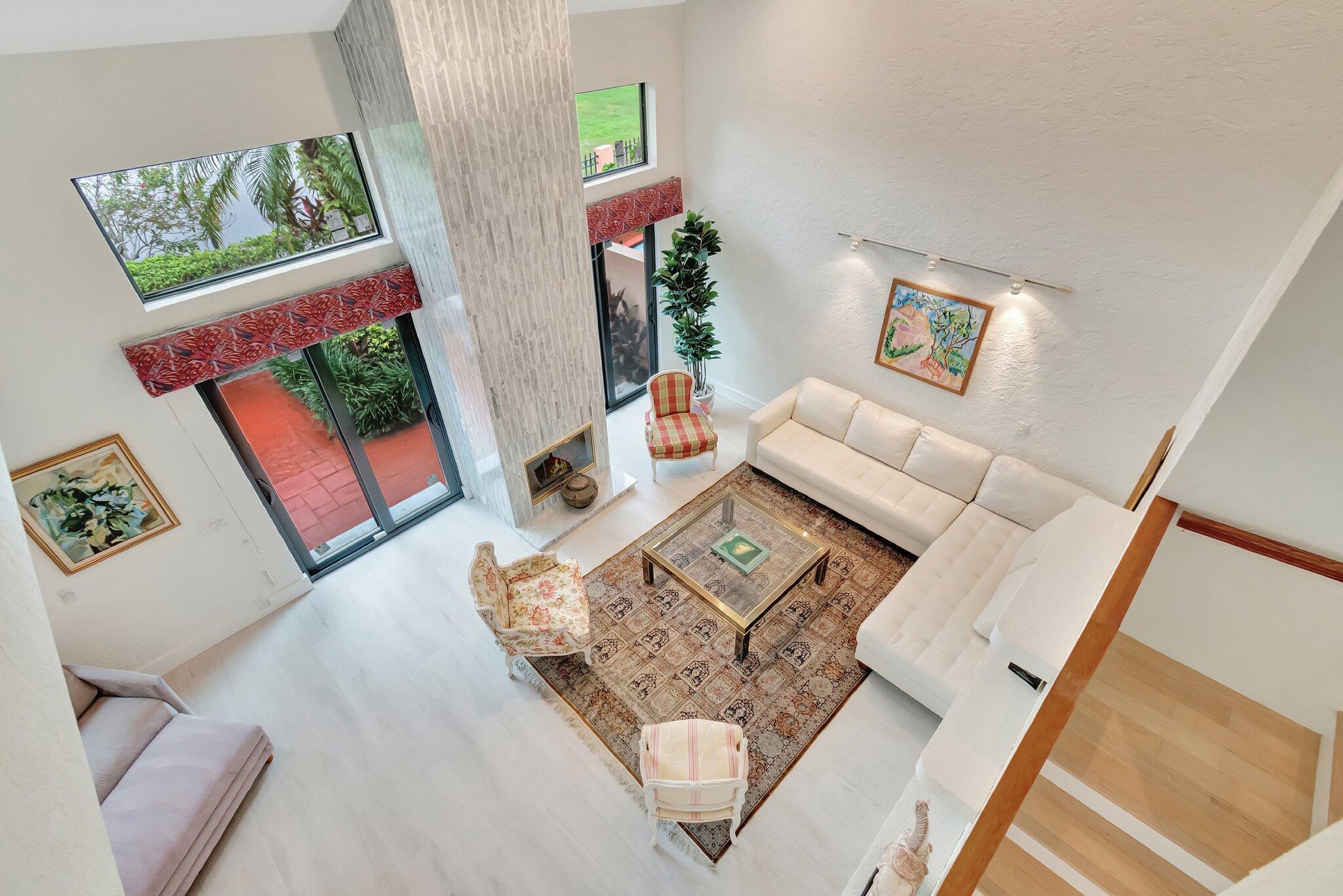 6427 Via Rosa Boca Raton, FL 33433 - Photo 40 of 80 a living room with furniture and a couch