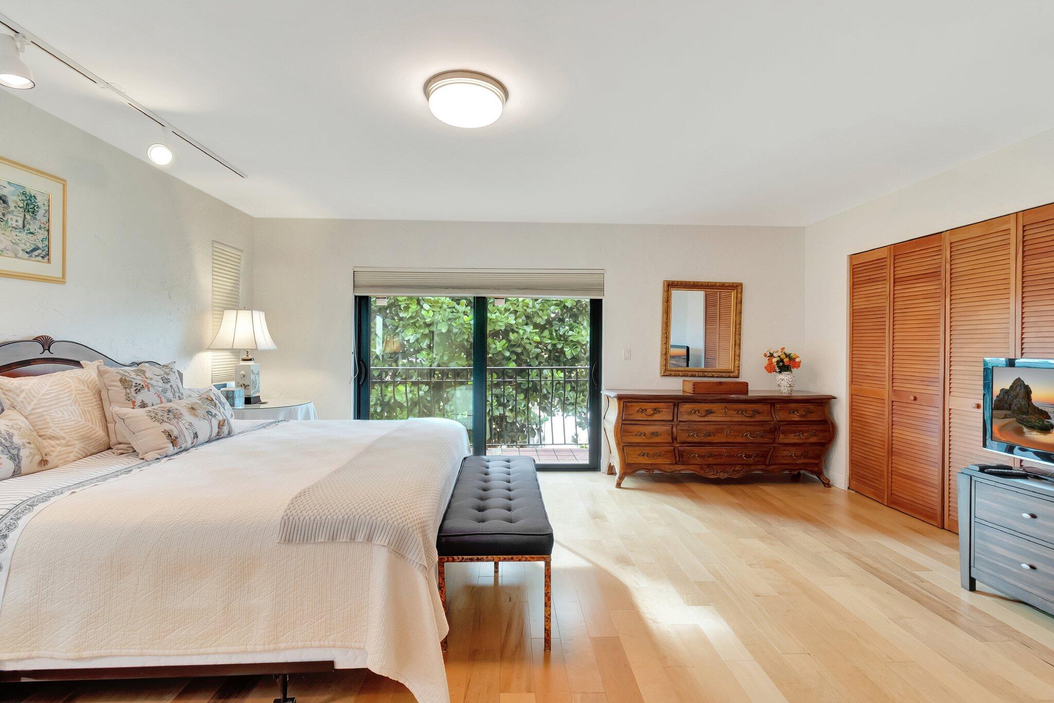 6427 Via Rosa Boca Raton, FL 33433 - Photo 49 of 80 a bed room with a bed and a window