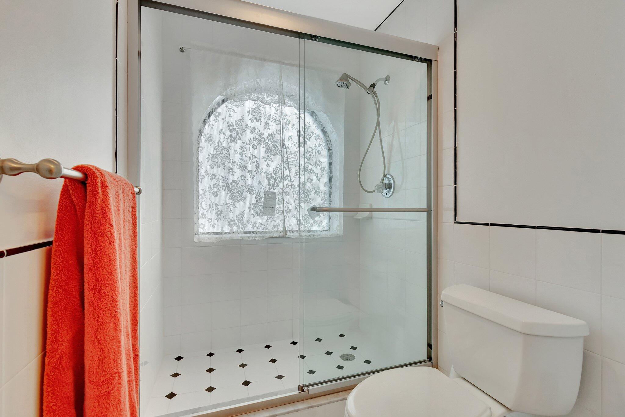 6427 Via Rosa Boca Raton, FL 33433 - Photo 59 of 80 a bathroom with a toilet and a shower