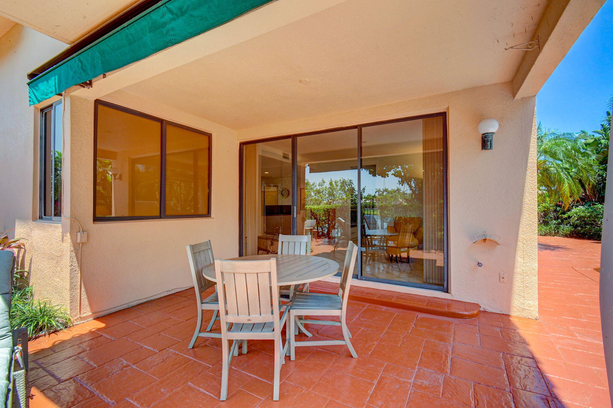 6427 Via Rosa Boca Raton, FL 33433 - Photo 65 of 80 a dining room with furniture and wooden floor
