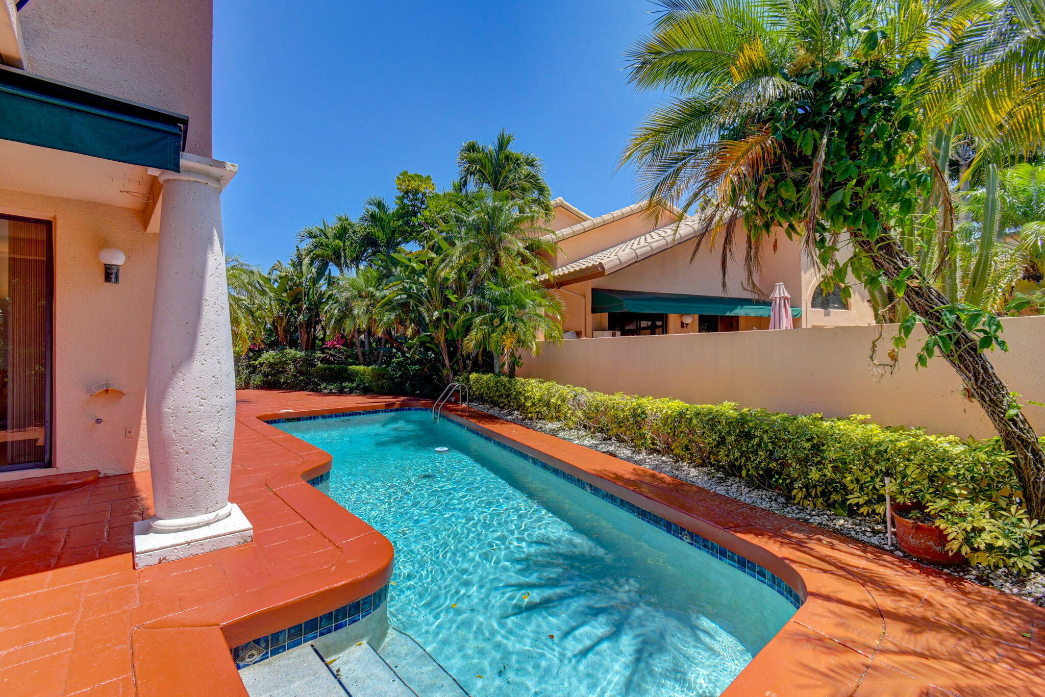 6427 Via Rosa Boca Raton, FL 33433 - Photo 71 of 80 a view of an house with swimming pool garden and patio