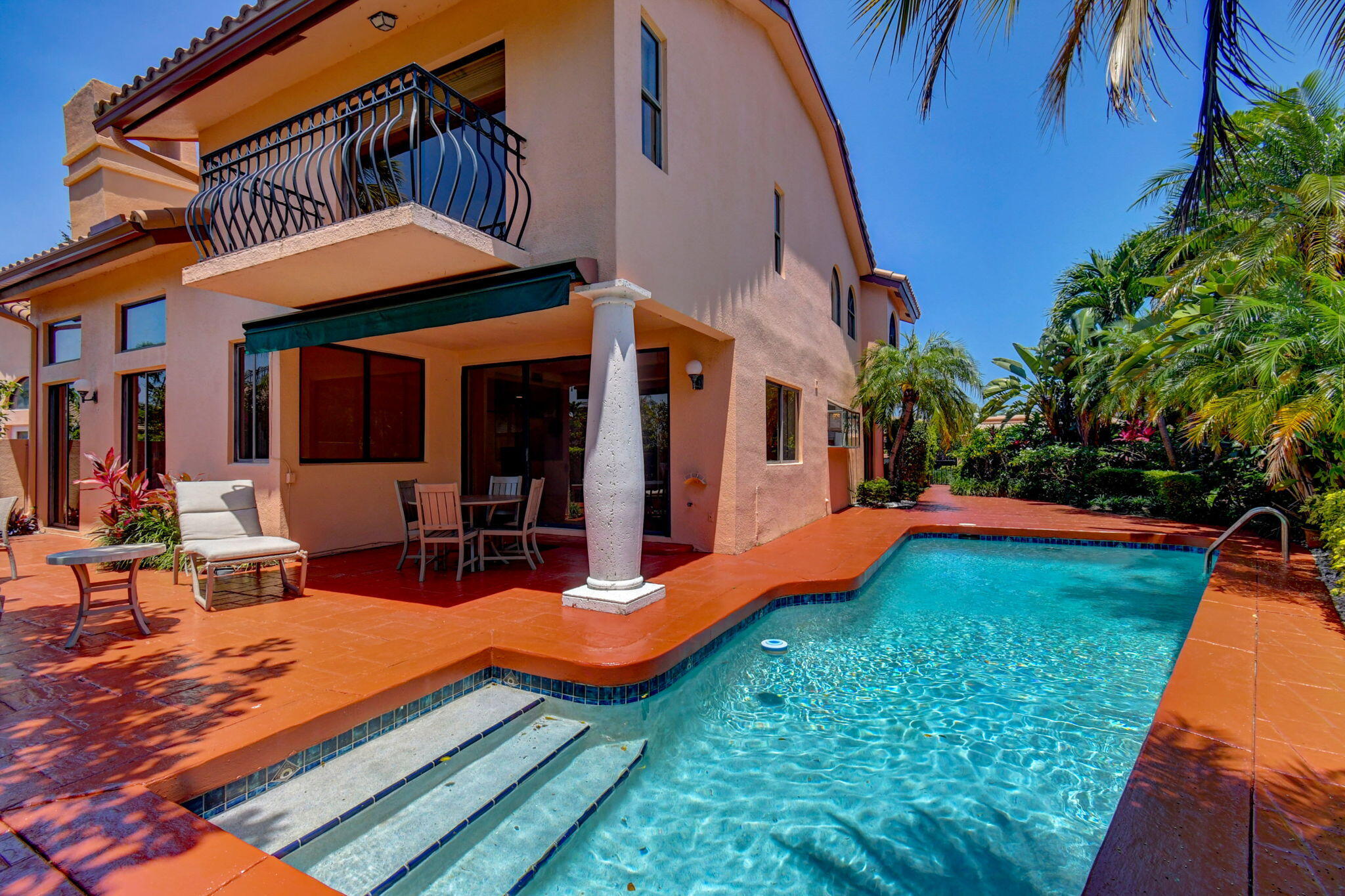 6427 Via Rosa Boca Raton, FL 33433 - Photo 72 of 80 a view of a house with swimming pool and sitting area