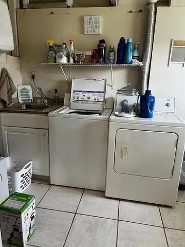 a storage room with washer and dryer