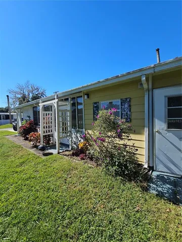 a view of a house with patio