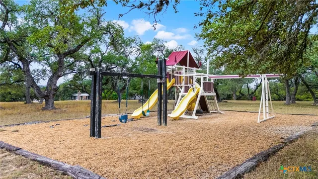 a view of park with a slide