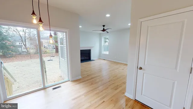 a view of entryway with wooden floor
