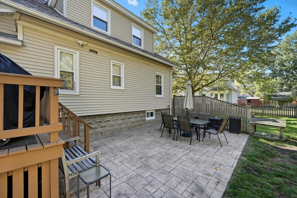 30 Athol Street Springfield, MA 01107 - Photo 25 of 38 a view of a house with patio and a yard