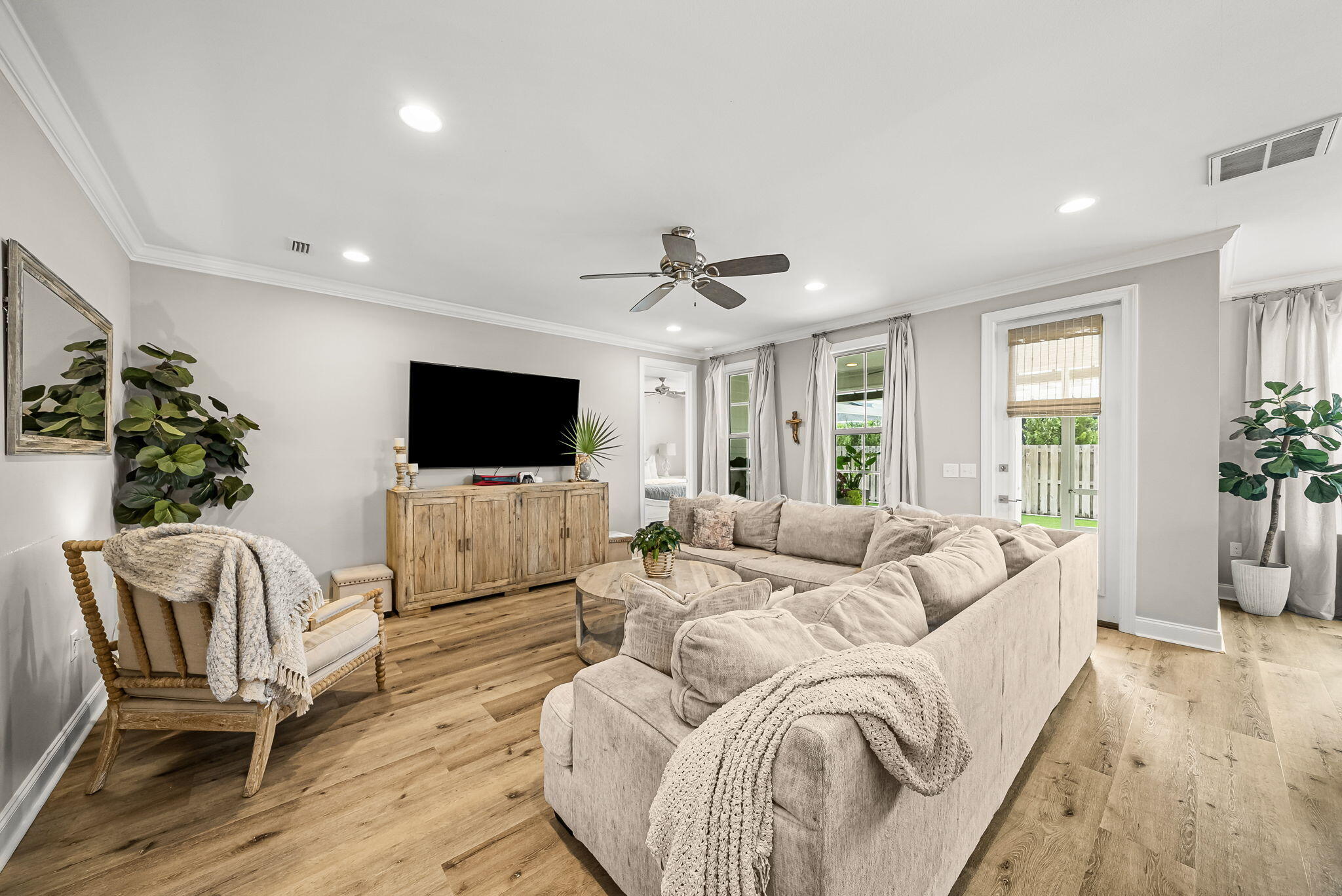 290 Windrow Way Watersound, FL 32461 - Photo 14 of 43 a living room with furniture and a flat screen tv