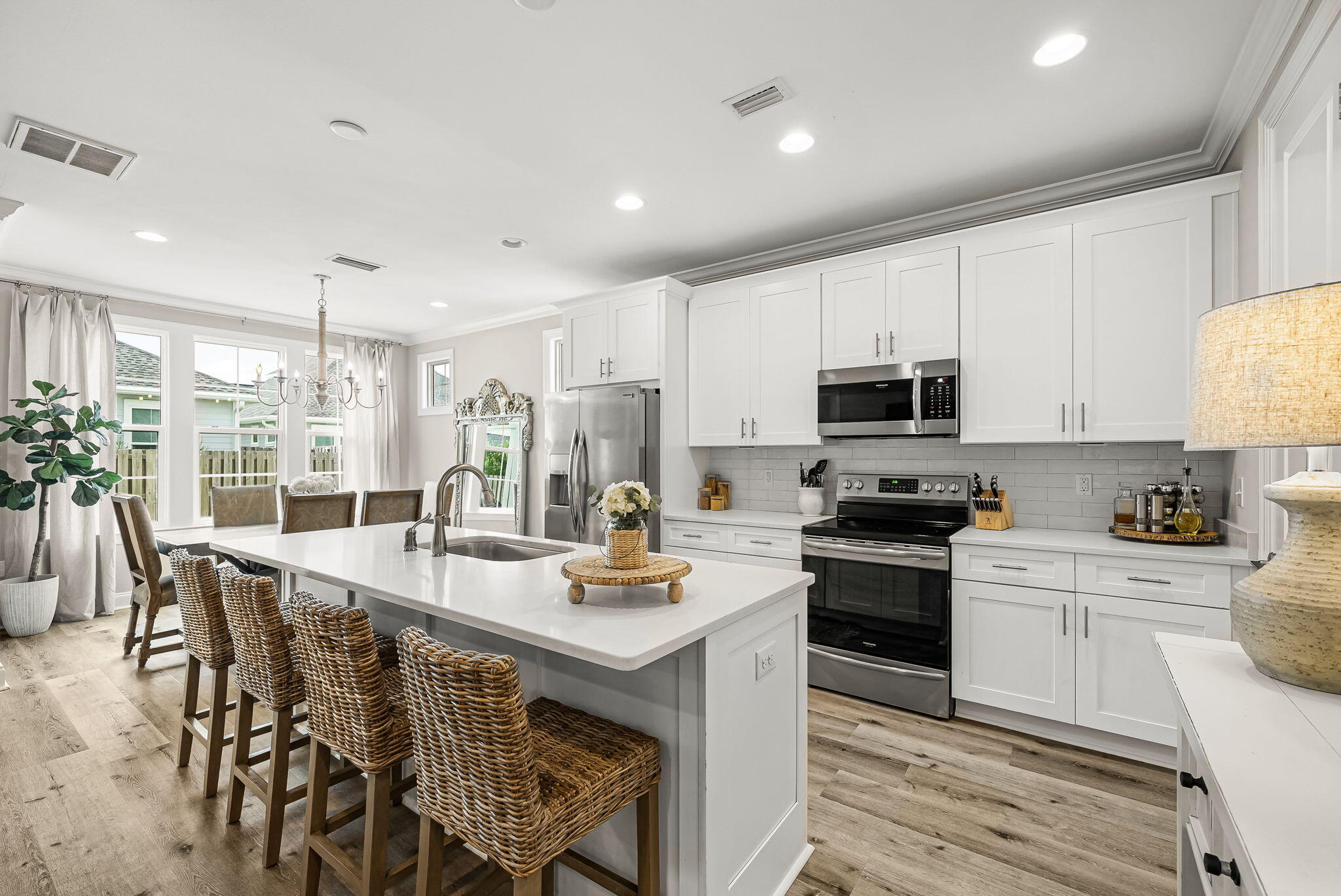 290 Windrow Way Watersound, FL 32461 - Photo 16 of 43 a kitchen with appliances a sink and cabinets