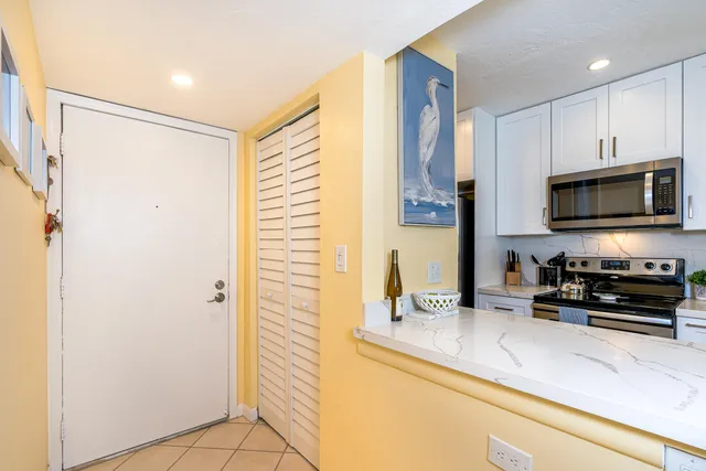 a view of a street with a building in the background