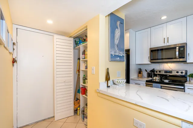 a view of swimming pool with outdoor space and seating area
