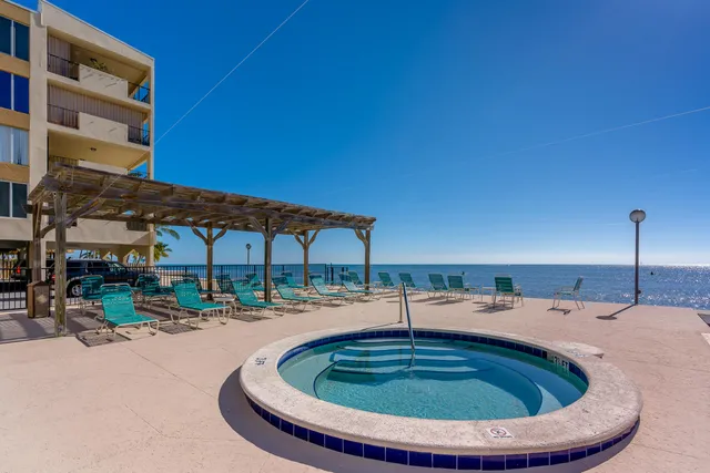 a view of a park with swings and slides