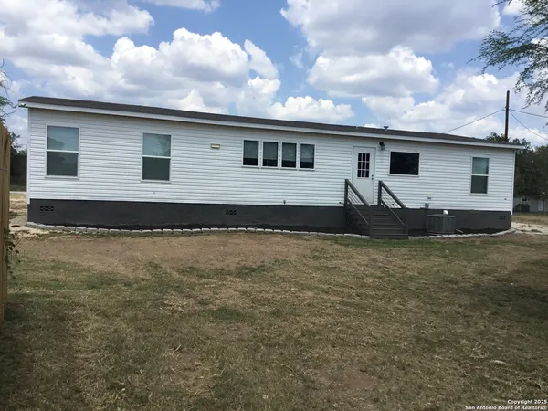a front view of house with yard