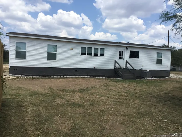 a front view of house with yard