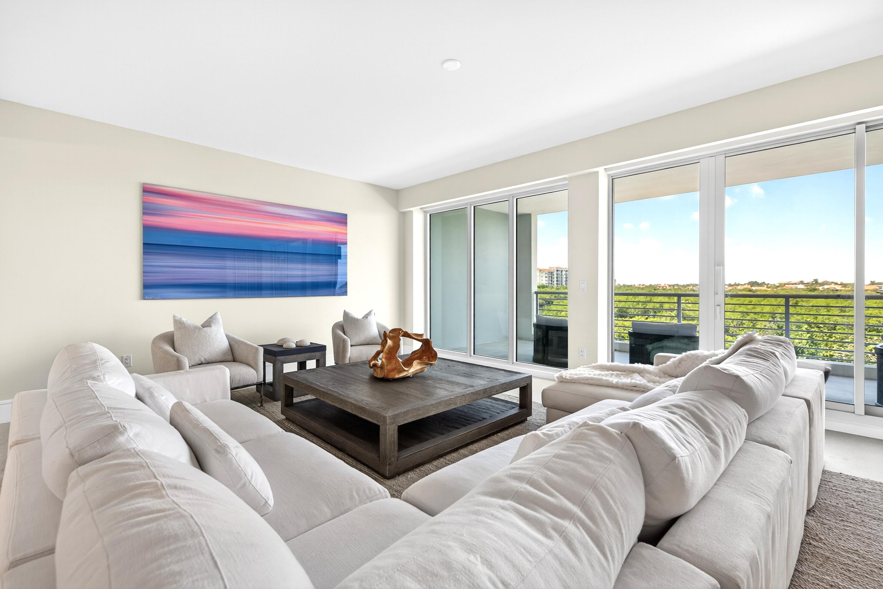 1 South Coastal Way, Unit 3030 Jupiter, FL 33477 - Photo 14 of 61 a living room with furniture and a large window