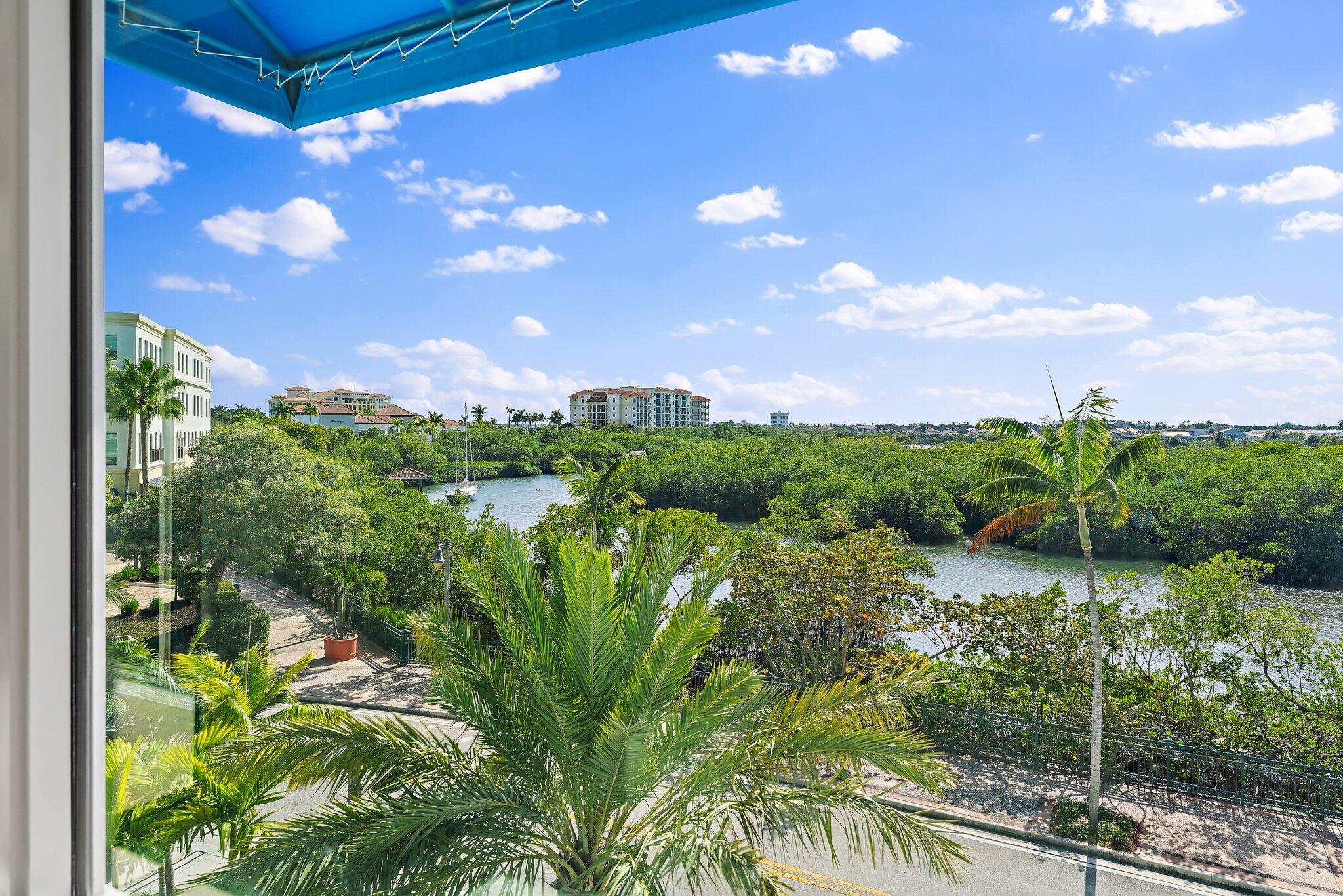 1 South Coastal Way, Unit 3030 Jupiter, FL 33477 - Photo 18 of 61 a view of a lake from a yard