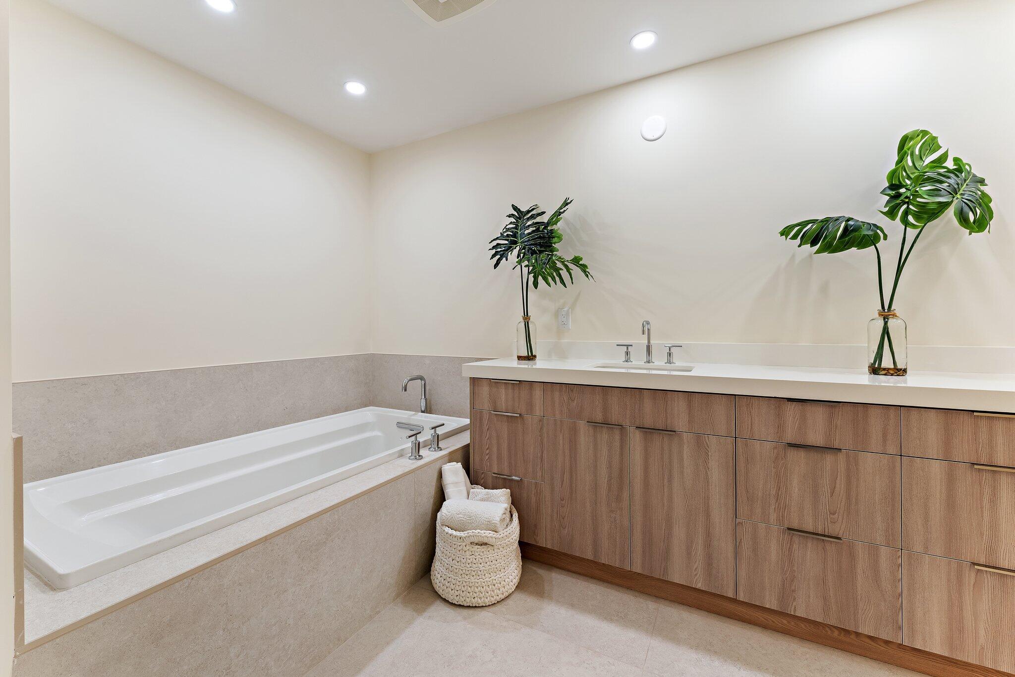 1 South Coastal Way, Unit 3030 Jupiter, FL 33477 - Photo 20 of 61 a bathroom with a sink and a bathtub