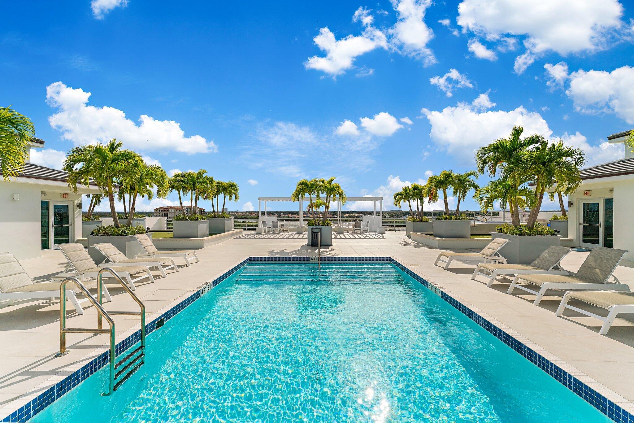 1 South Coastal Way, Unit 3030 Jupiter, FL 33477 - Photo 42 of 61 a view of a swimming pool with outdoor seating