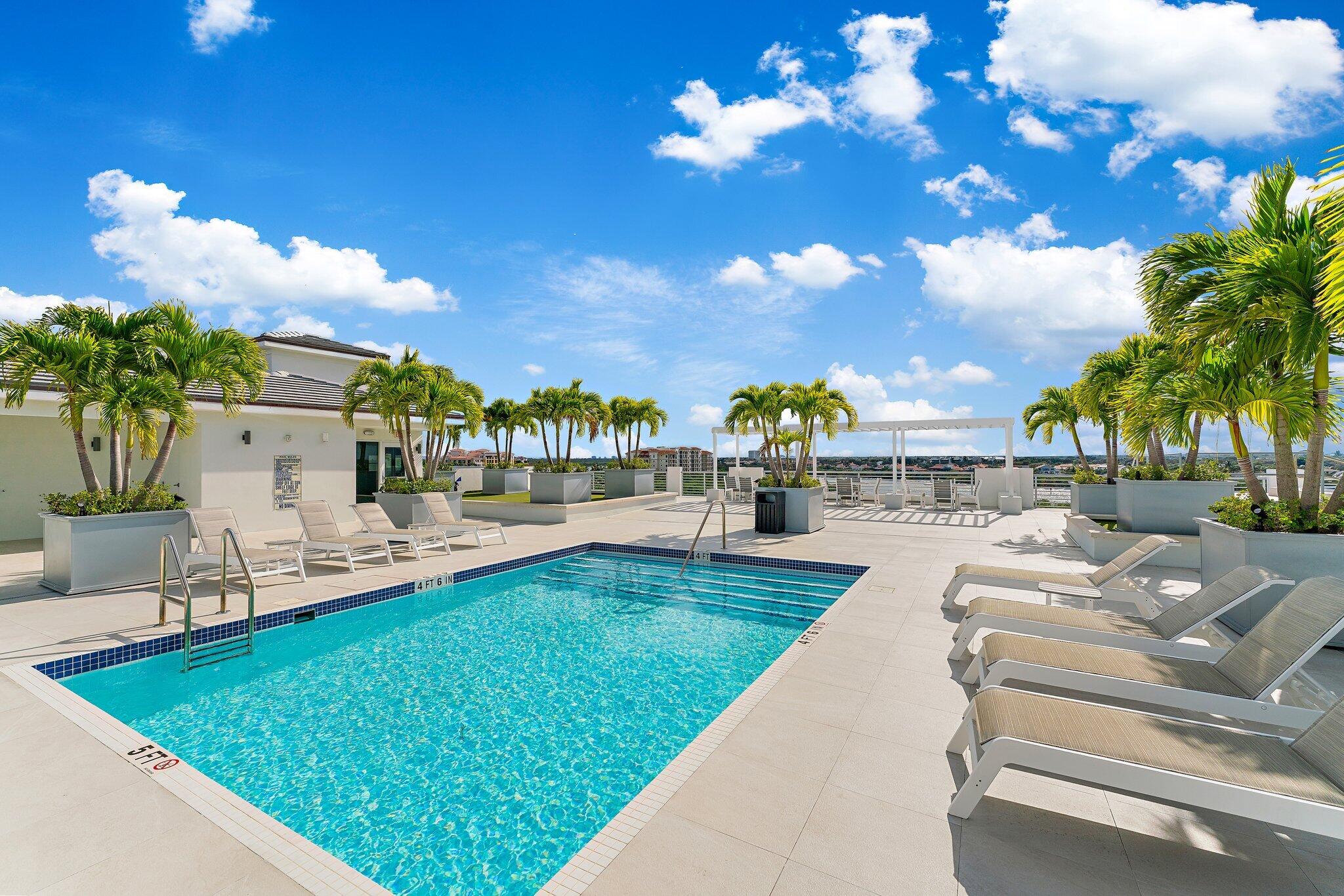 1 South Coastal Way, Unit 3030 Jupiter, FL 33477 - Photo 43 of 61 a view of swimming pool with outdoor seating