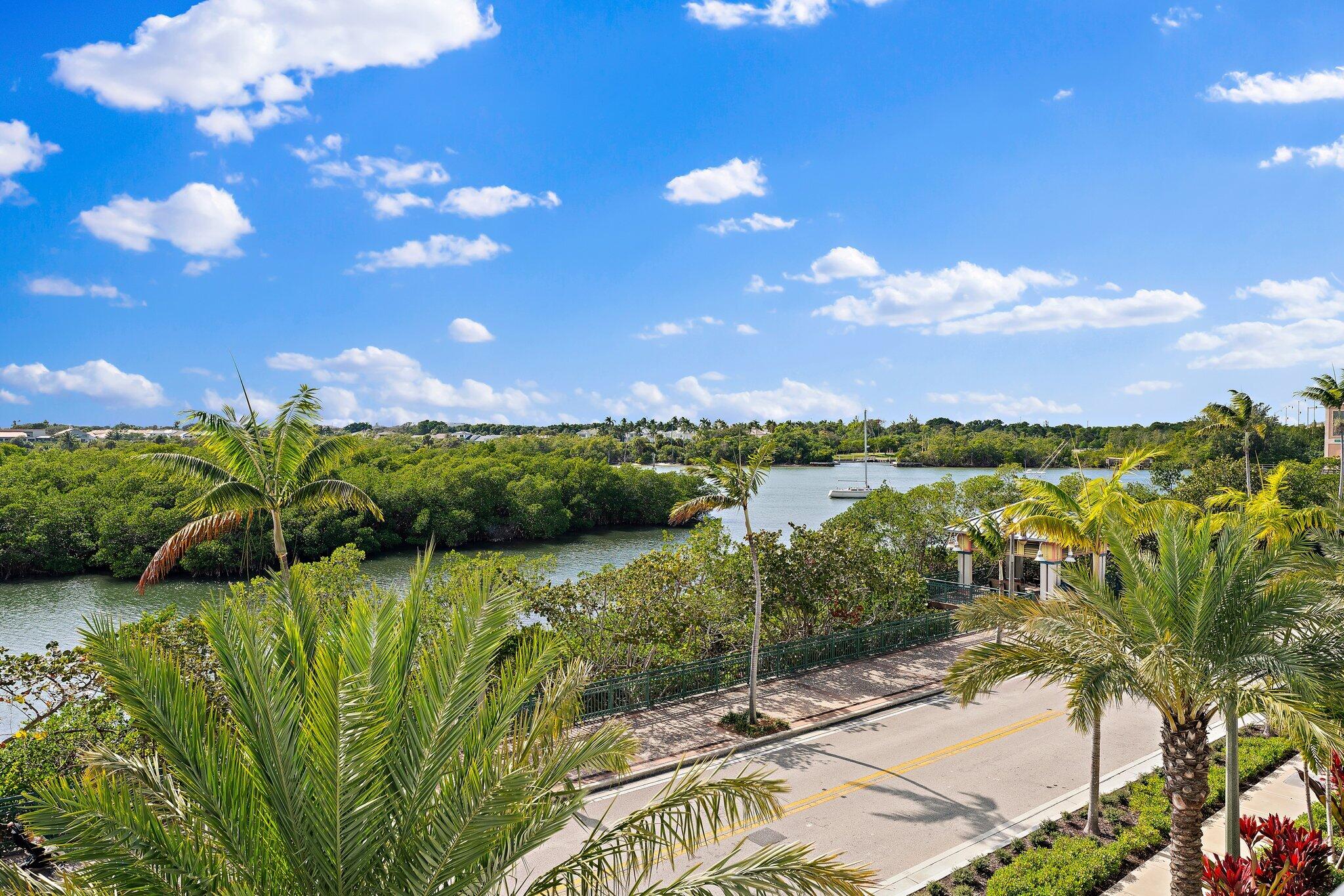 1 South Coastal Way, Unit 3030 Jupiter, FL 33477 - Photo 10 of 61 a view of a lake with a yard