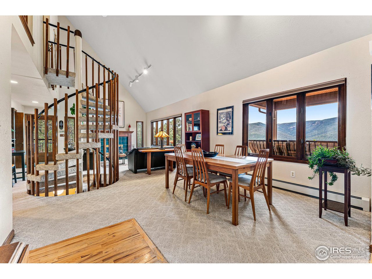 297 Broken Fence Road Boulder, CO 80302 - Photo 16 of 39 Dining area on main level towards living room