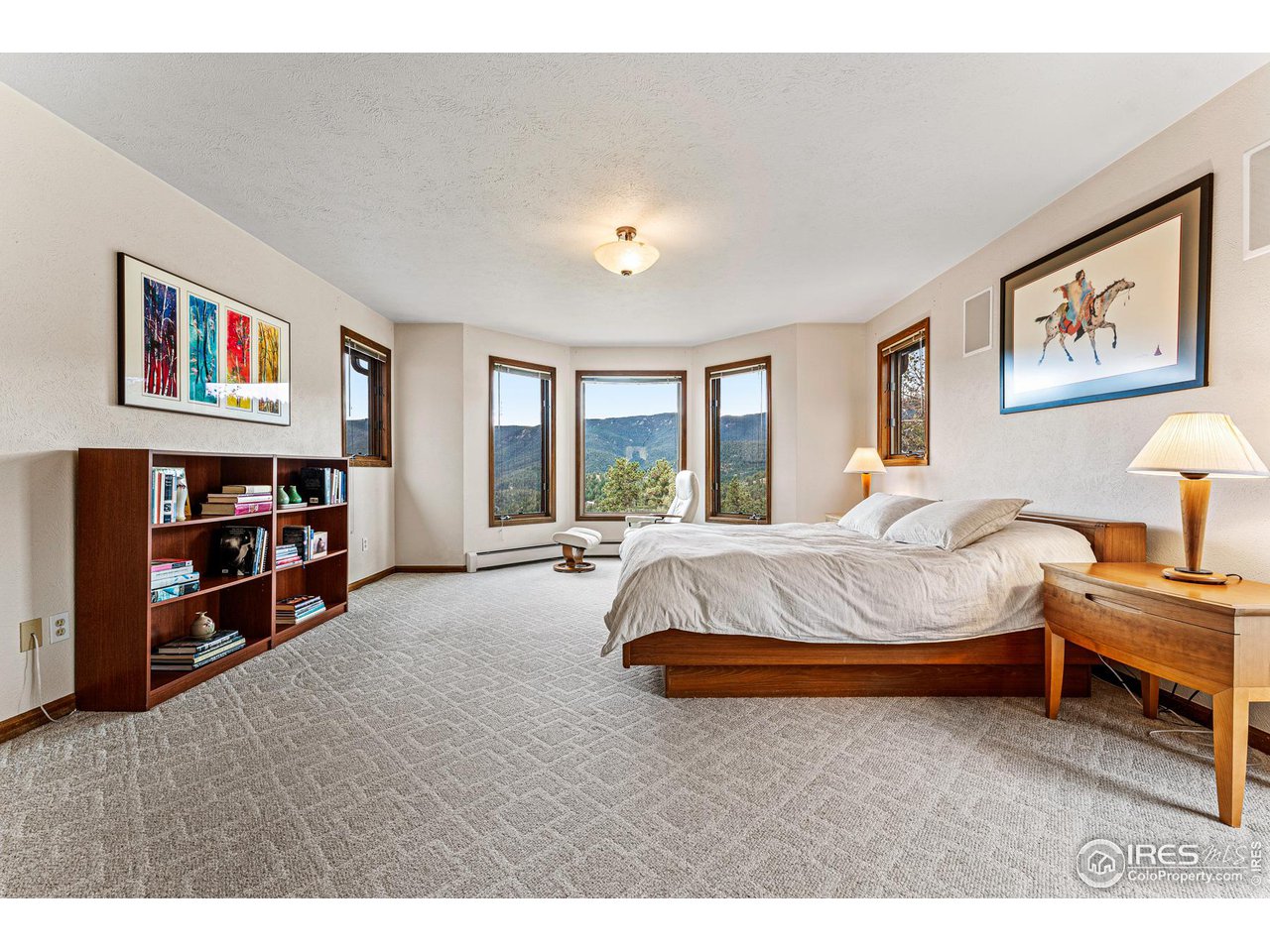 297 Broken Fence Road Boulder, CO 80302 - Photo 22 of 39 Spacious primary bedroom on upper level with great southern views/light