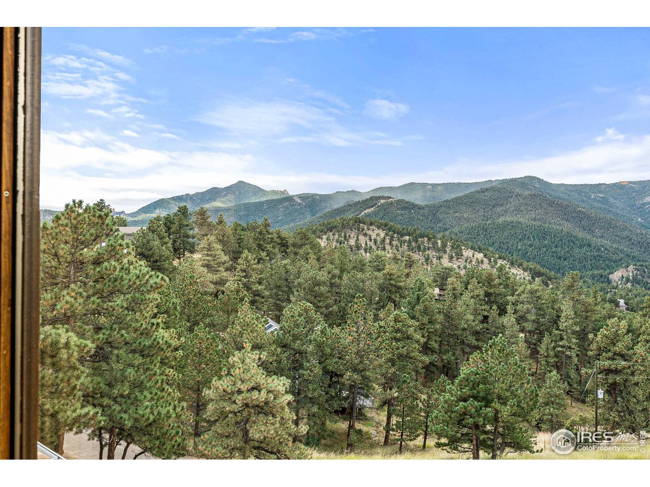 297 Broken Fence Road Boulder, CO 80302 - Photo 24 of 39 View from the primary bedroom to the southeast down Boulder Canyon