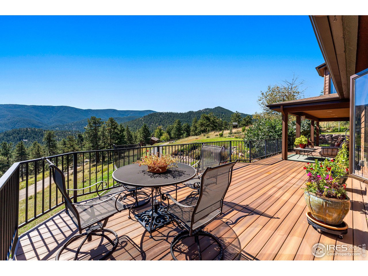 297 Broken Fence Road Boulder, CO 80302 - Photo 5 of 39 Huge front deck with southern exposure