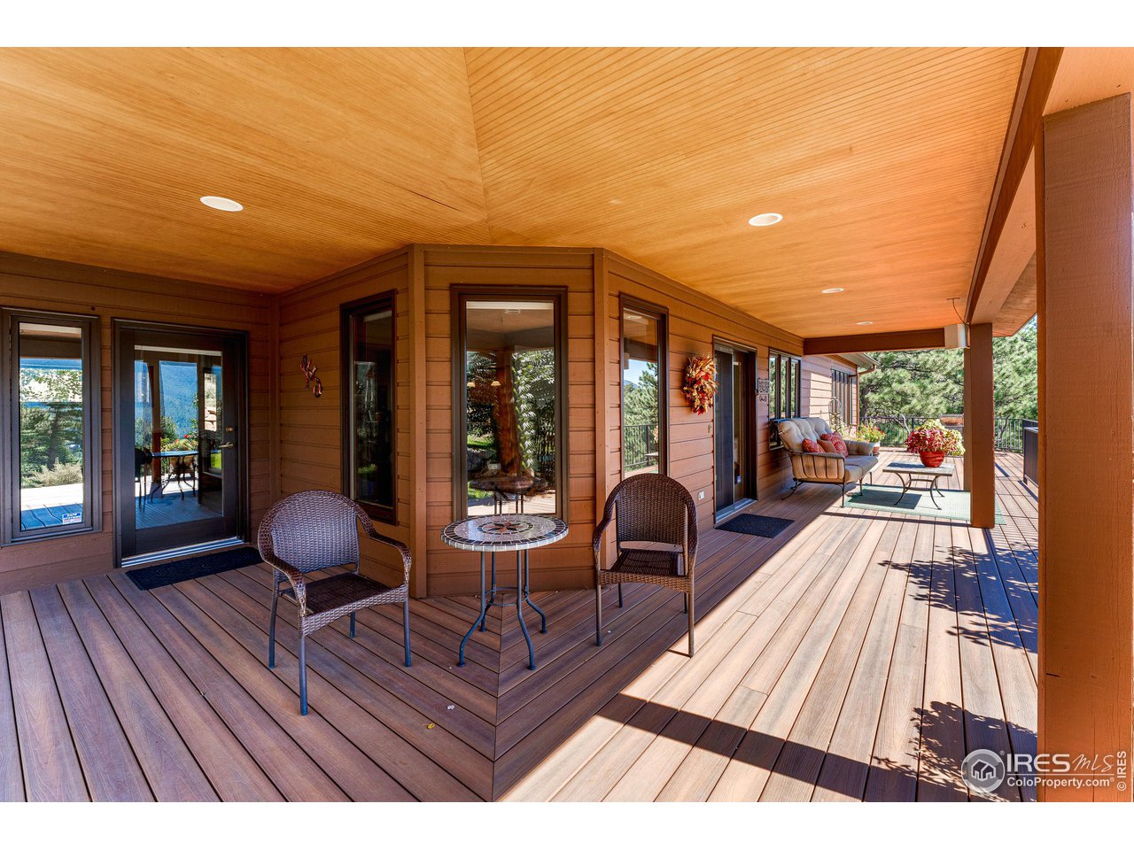 297 Broken Fence Road Boulder, CO 80302 - Photo 6 of 39 857 share feet of wrap around Trex front deck covered & uncovered