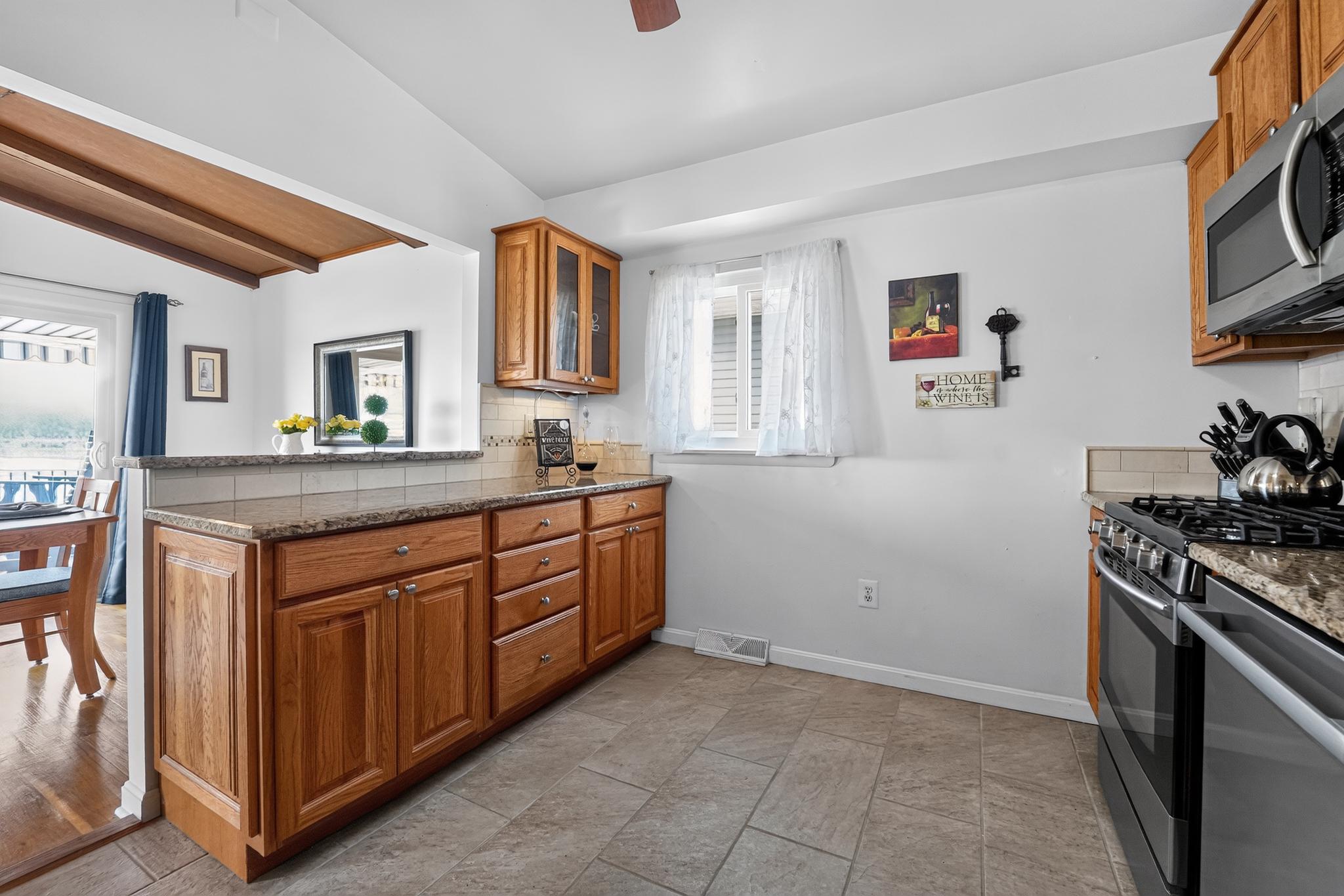 221 Atlanta Road Pasadena, MD 21122 - Photo 10 of 38 Granite Counters & Ceramic Tile Floors