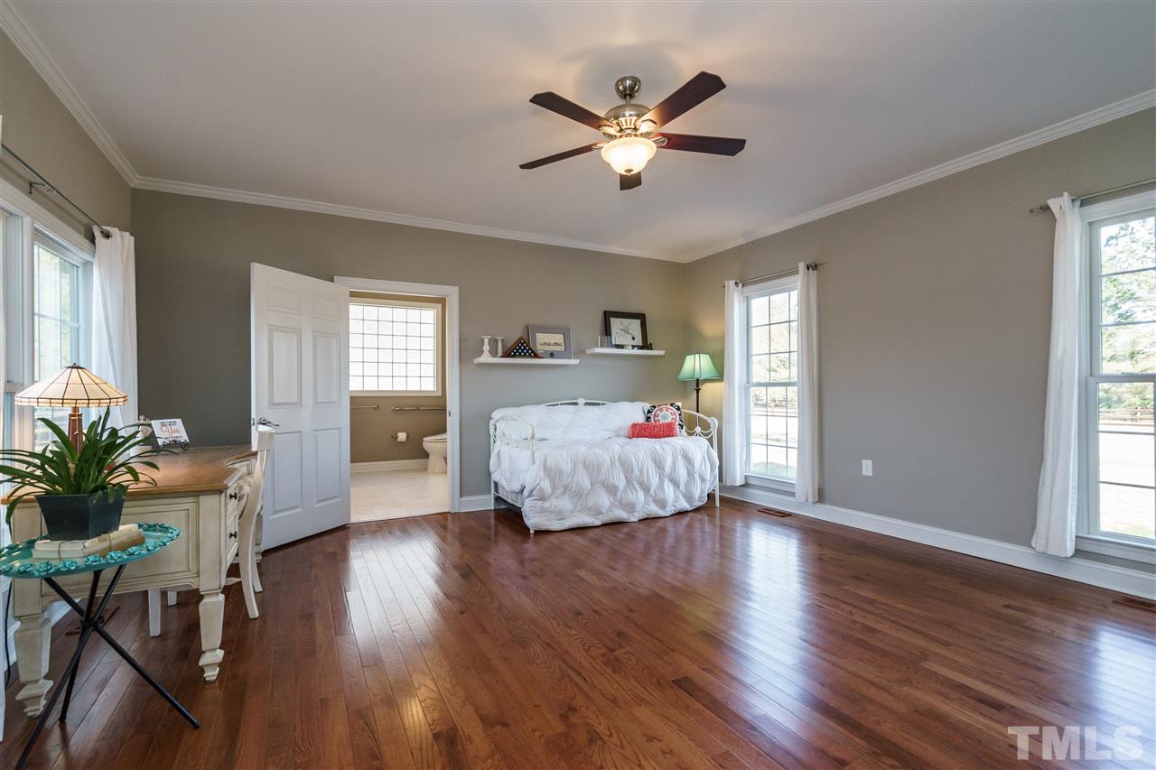 904 Windrow Lane Raleigh, NC 27603 - Photo 10 of 25 Doubles as downstairs master and offers widened doorways, no-step entry, and exterior ramp.