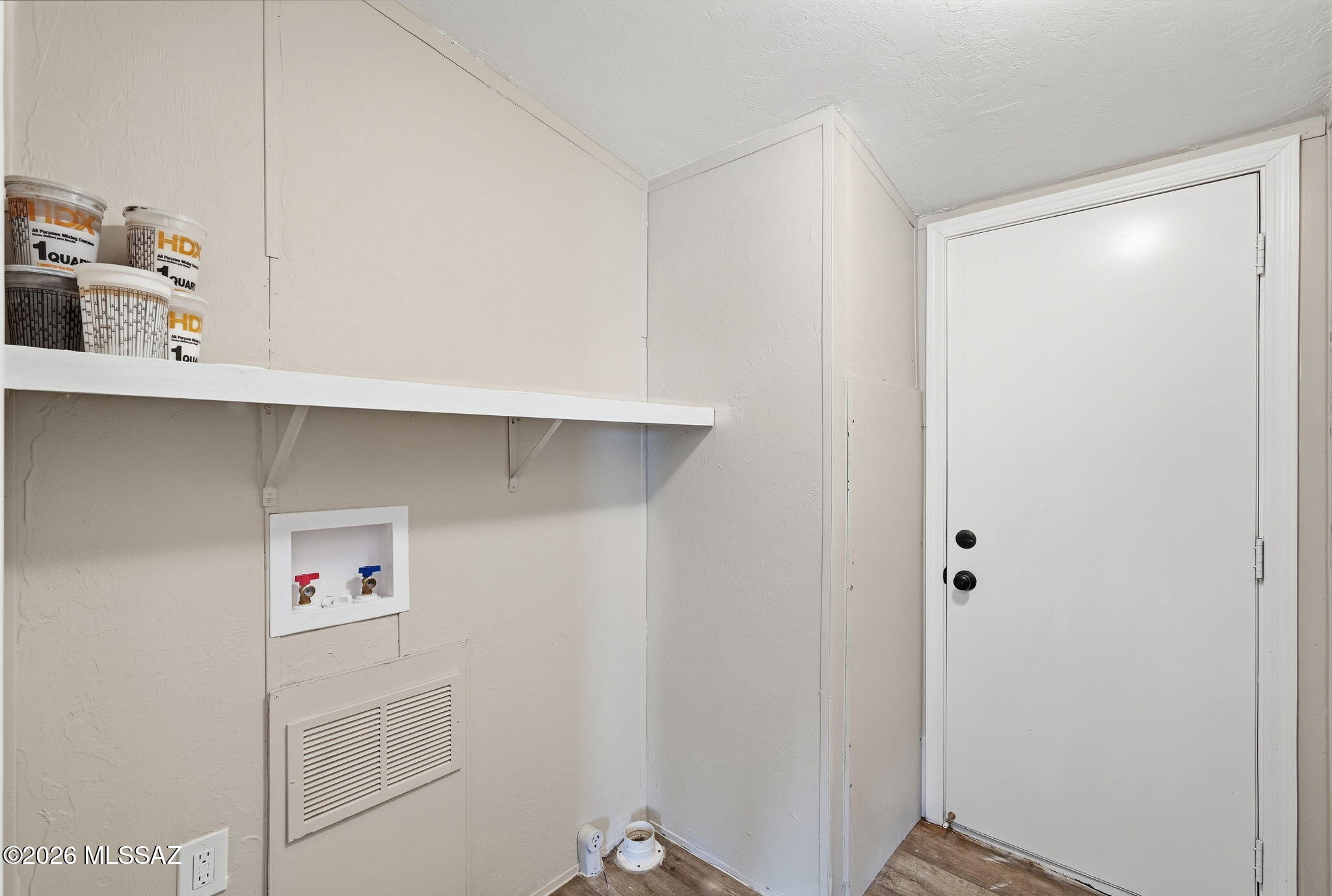 8690 South Marstellar Road Tucson, AZ 85736 - Photo 8 of 51 Laundry room with electric dryer hook-up