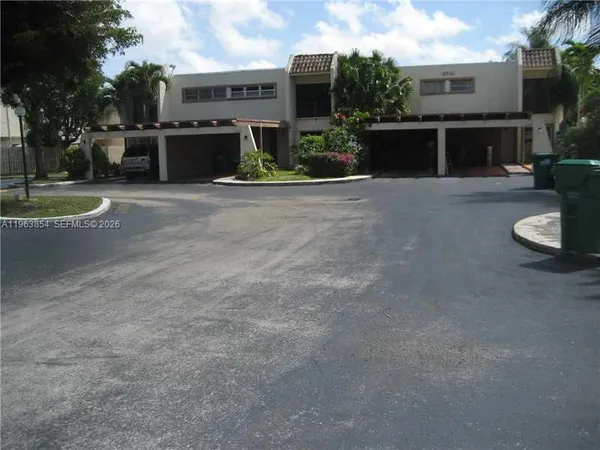 a view of a house with a park