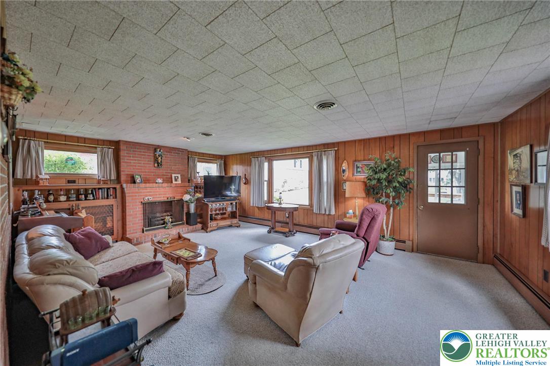 141 East Berger Street Emmaus, PA 18049 - Photo 13 of 49 a living room with furniture and a large window