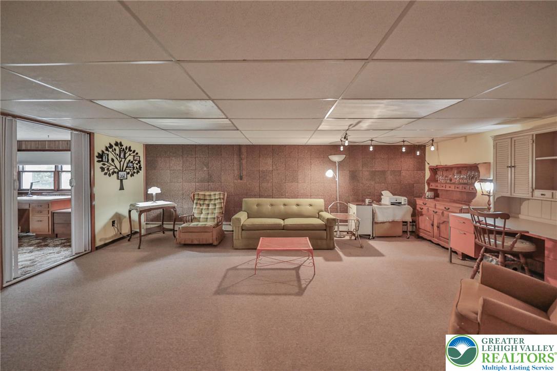 141 East Berger Street Emmaus, PA 18049 - Photo 23 of 49 a living room with furniture and a table
