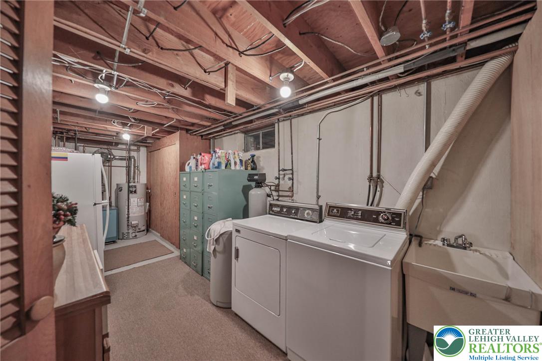 141 East Berger Street Emmaus, PA 18049 - Photo 29 of 49 a view of a storage room with washer and dryer