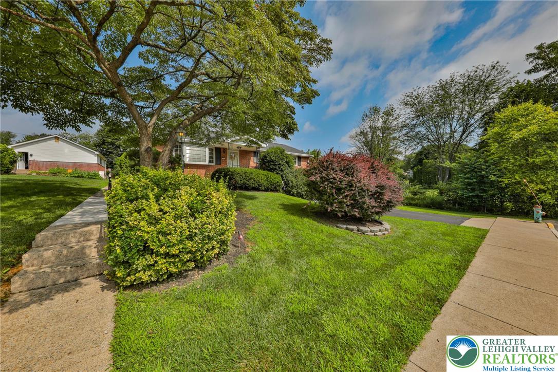 141 East Berger Street Emmaus, PA 18049 - Photo 3 of 49 a view of a garden with a tree