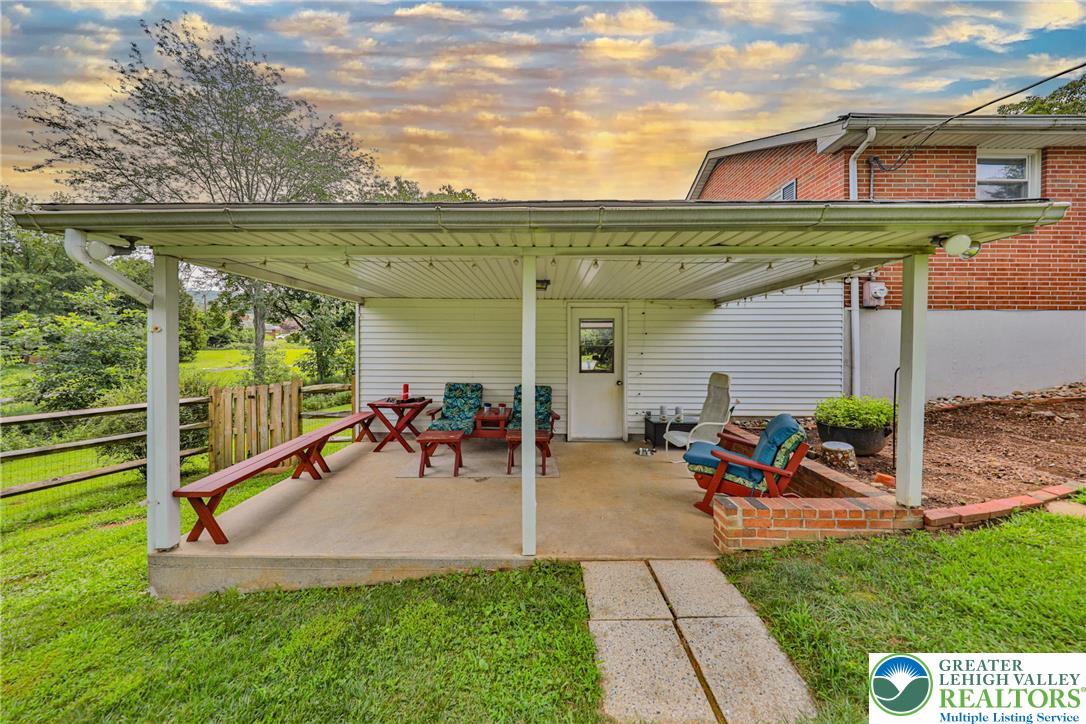 141 East Berger Street Emmaus, PA 18049 - Photo 32 of 49 a view of a swimming pool with a patio and a garden