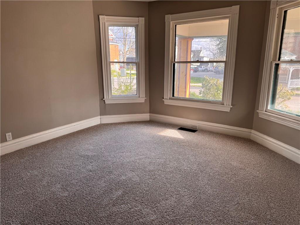 809 Linden Street Sharon, PA 16146 - Photo 2 of 17 an empty room with windows