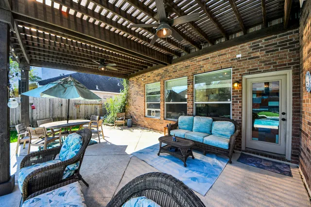 a outdoor living space with furniture and a couch