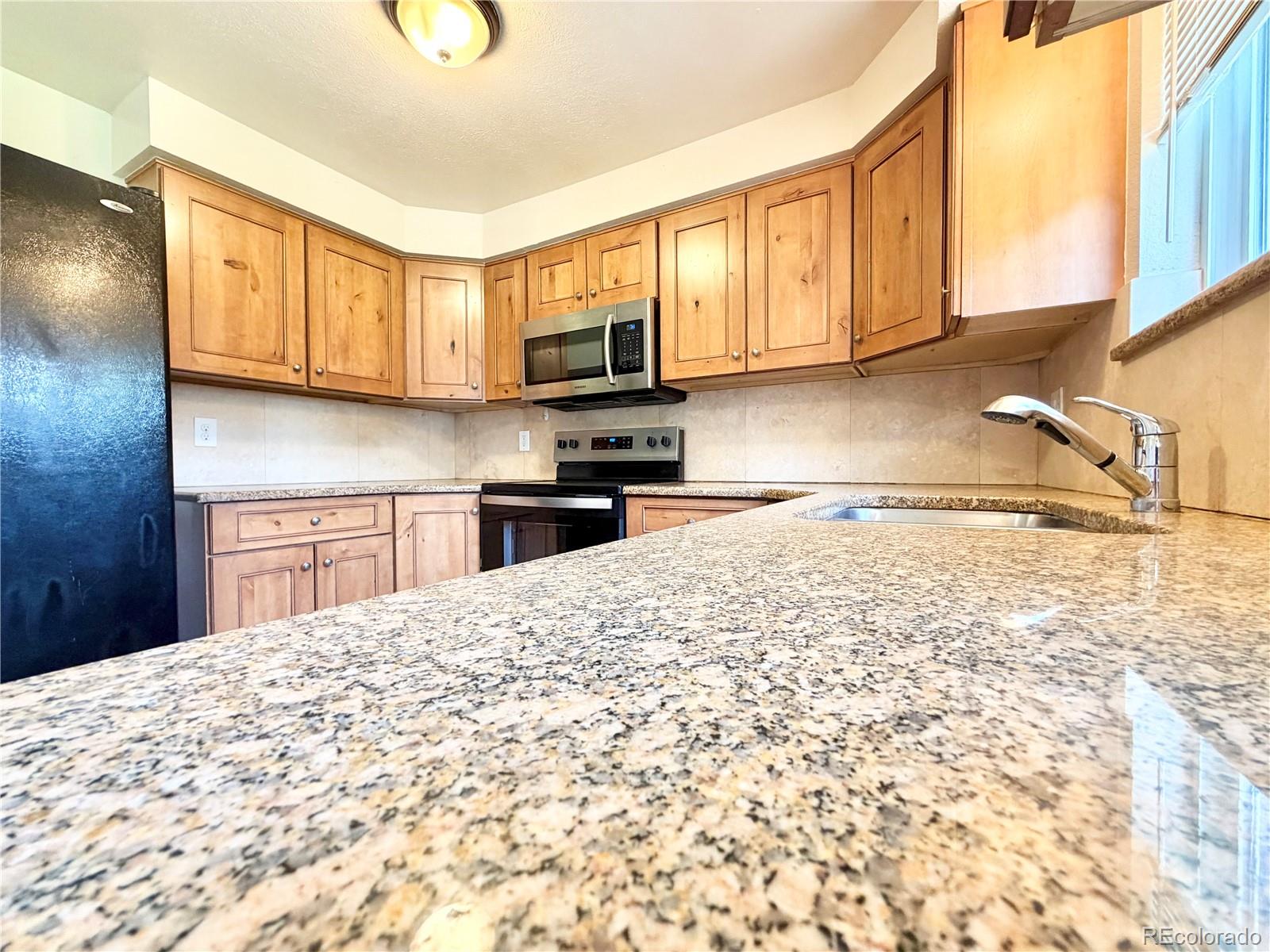 4700 Holland Street, Unit 4720 Wheat Ridge, CO 80033 - Photo 2 of 14