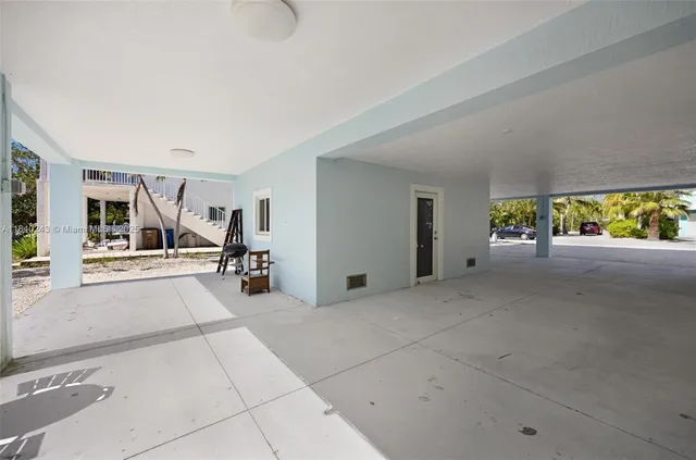a bathroom with a sink a light fixture a vanity and a mirror