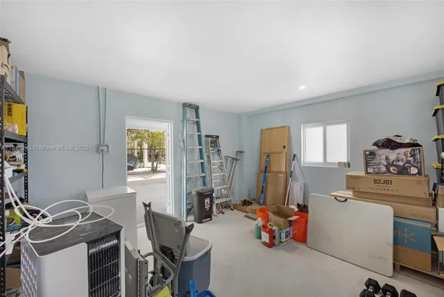 a bathroom with a sink vanity and a mirror